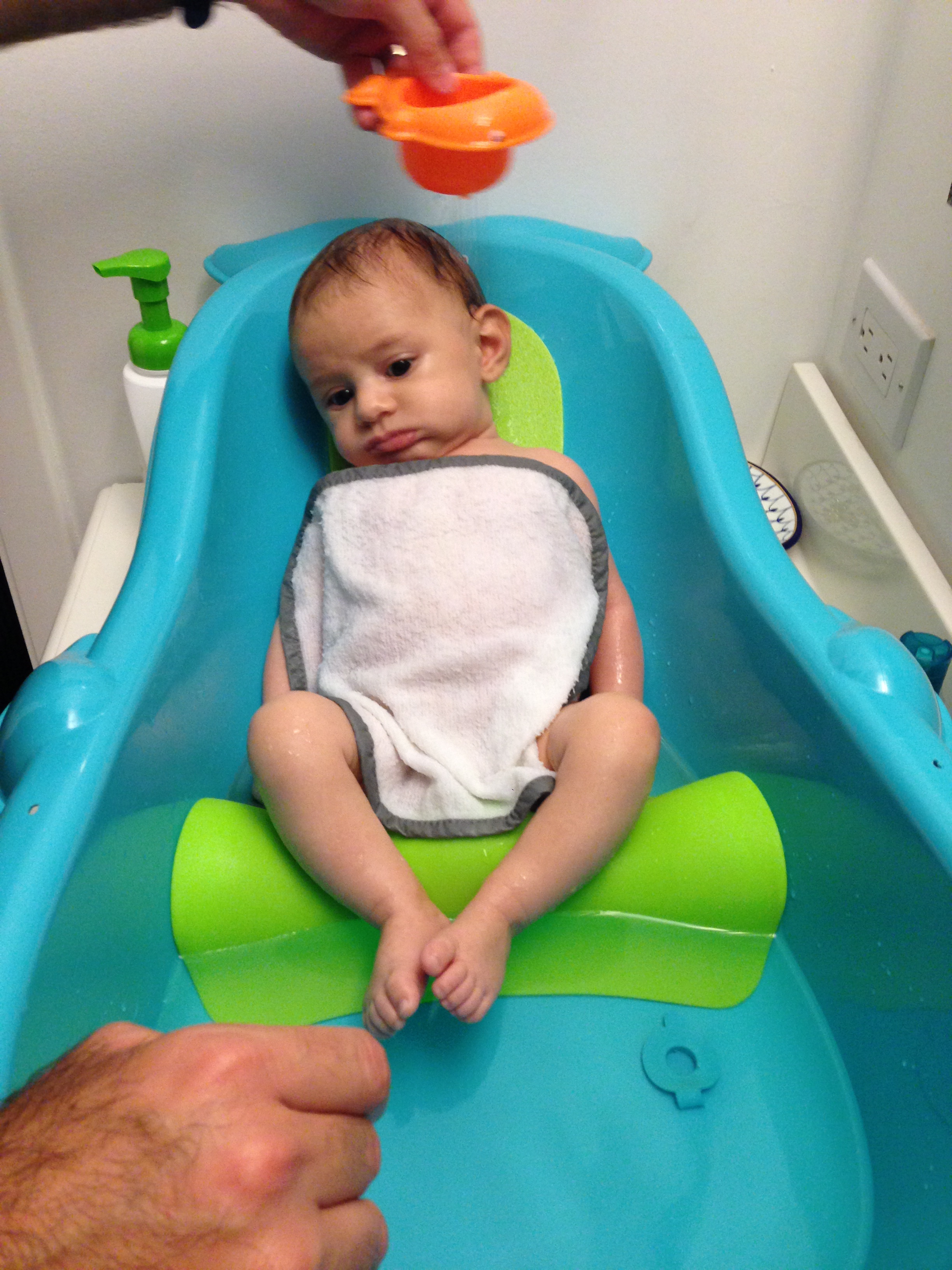 Alfie in his tub at almost 2 months